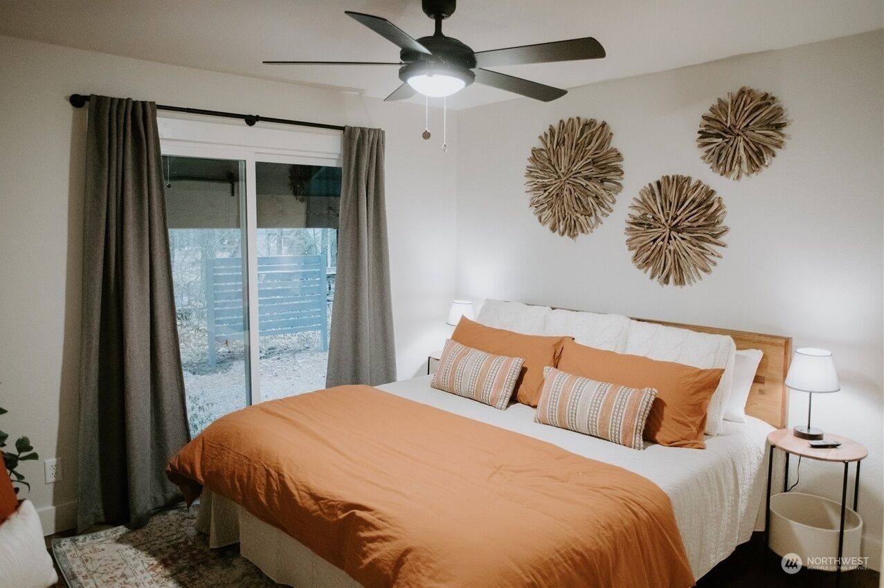 Primary bedroom in the main cabin has a King bed, closet, smart tv, ceiling fan.