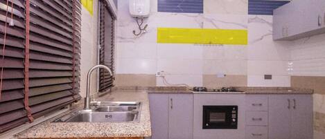 Appartement Deluxe, balcon, vue ville | Cuisine privée