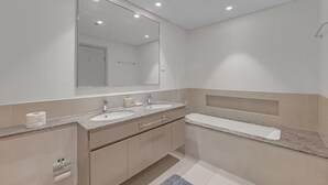Shower, towels, soap, toilet paper - 3 Bedroom in Forte Tower Near Burj Khalifa (Dubai)