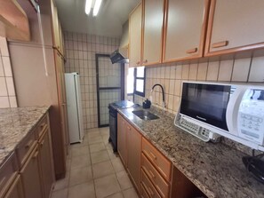 Private kitchen - Penthouse with the best view of Praia Brava, Florianópolis (Florianópolis)
