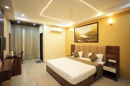Quarto casal standard, vista para a cidade | Wi-Fi de cortesia. Hotel MM Prestige Raipur