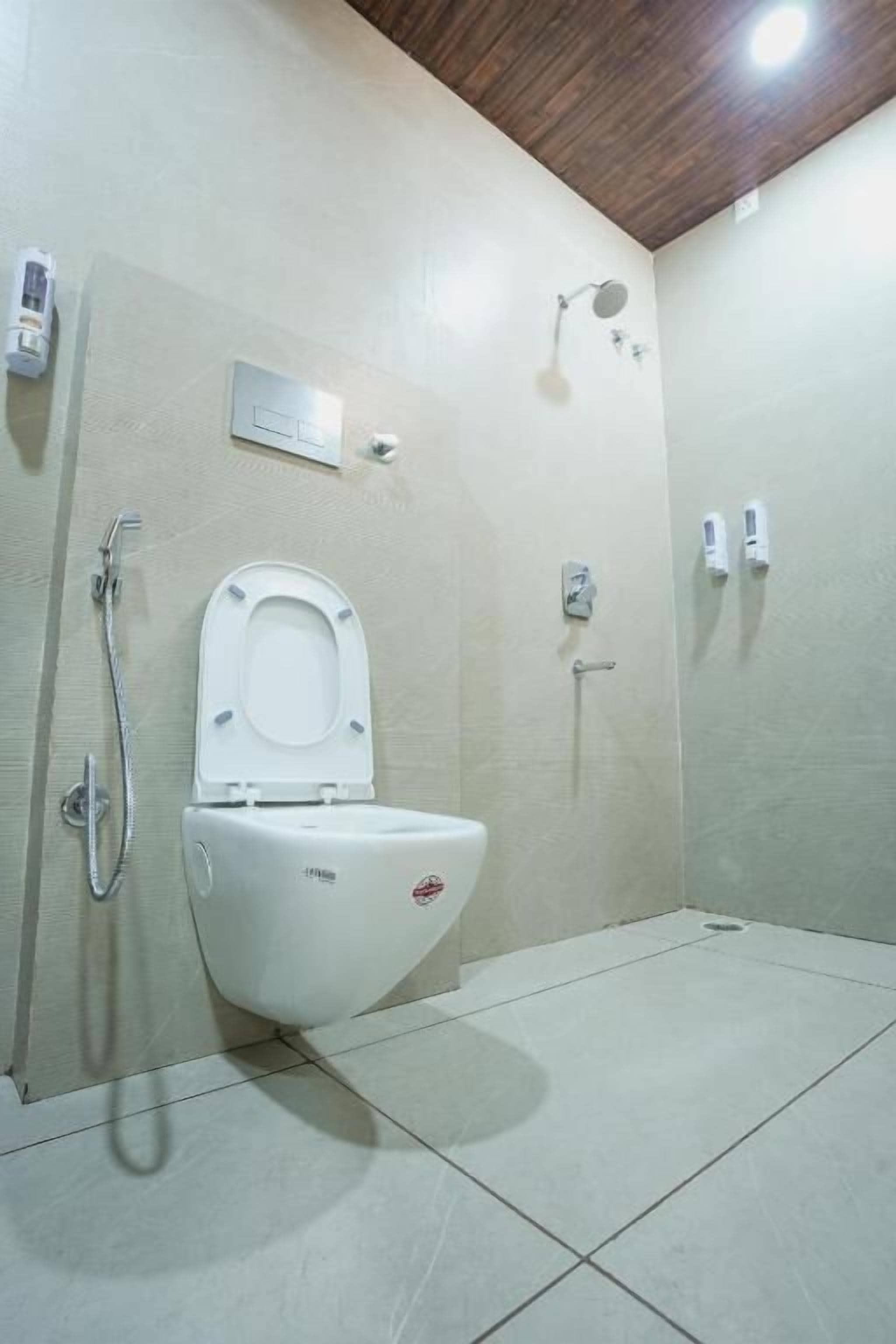 Shower, free toiletries, hair dryer, slippers