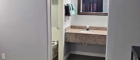 Hair dryer, towels, soap, toilet paper