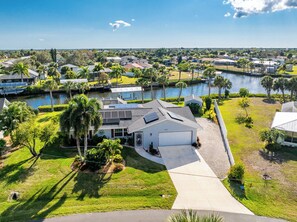 Exterior - Canal-Front 3BR w/ Heated Saltwater Pool, Dock, BBQ & Ping-Pong — Near Beaches! (Port Charlotte)