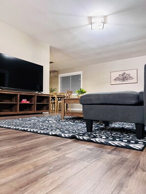 Smart TV, fireplace, foosball
