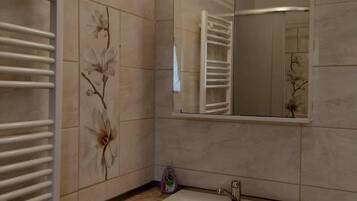 Shower, towels, soap, toilet paper