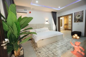 Family Room, Balcony, City View | Desk, laptop workspace, blackout curtains, soundproofing - Kawruky Hotel (Benin City)