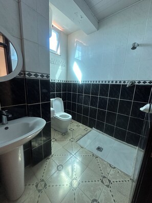 Comfort Single Room | Bathroom | Towels, soap, toilet paper - Safe Land Guest House (Mek'ele)