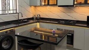 Family Apartment, Balcony, City View | Private kitchen - Alakim Residence and Suites (Benin City)