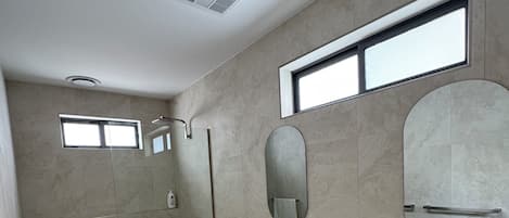 Shower, towels, soap, toilet paper