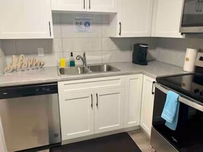 Microwave, oven, stovetop, dishwasher - Folte's Home Away from Home 2 bedroom Basement Suite (Edmonton)