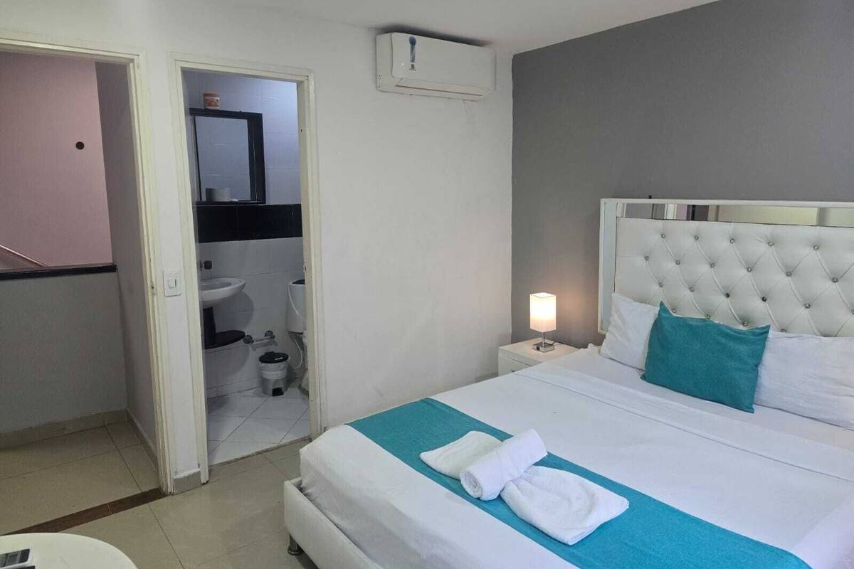 Basic Triple Room, Courtyard View | Iron/ironing board, free WiFi, bed sheets