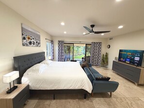 Villa master bedroom with king bed, ceiling fan, TV, sunroom, walk in closet - Private Pickleball Villa, Pool Oasis, Chic Casita (San Diego County)