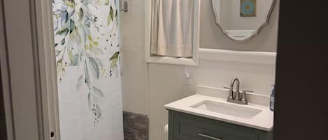 Hair dryer, towels, soap, toilet paper