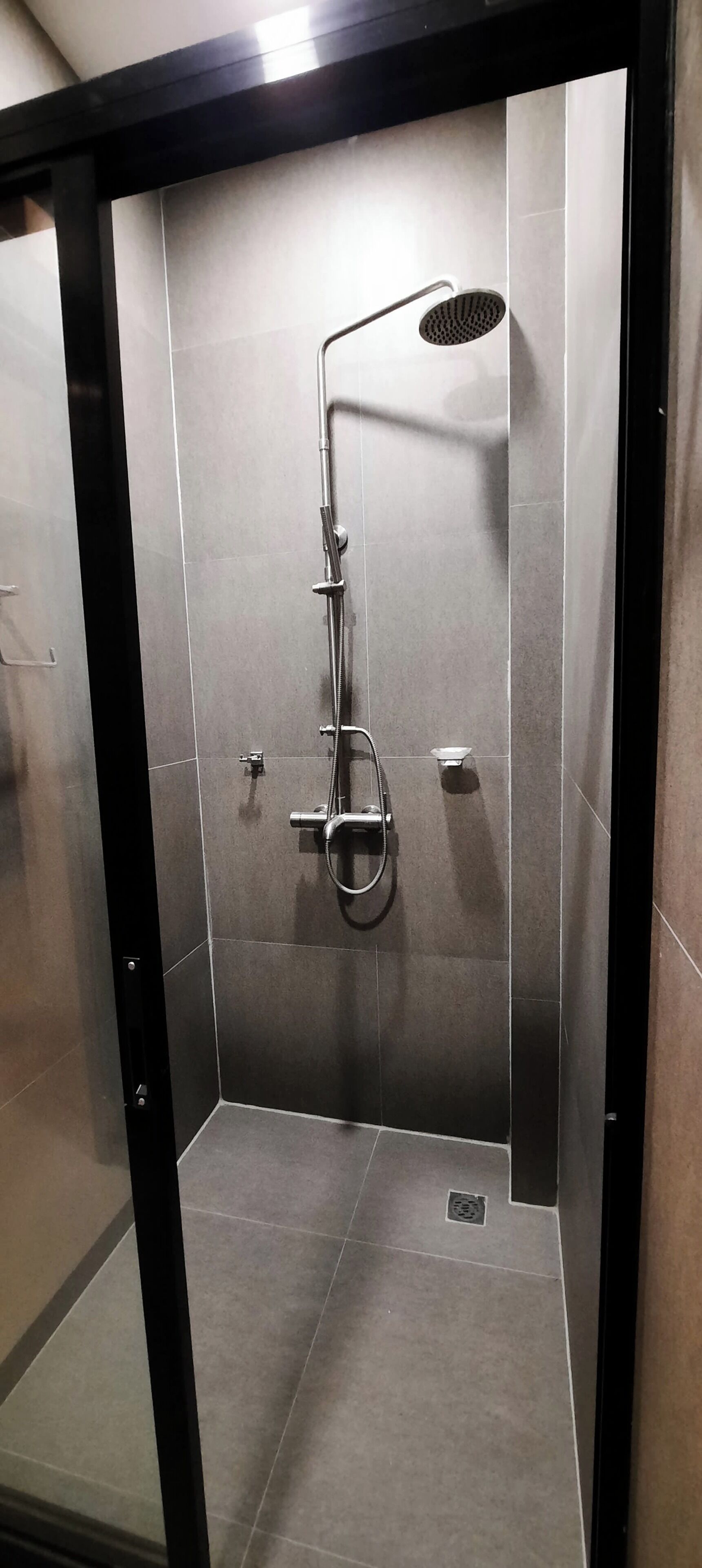 Shower, towels, soap, toilet paper