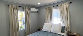 Cozy Modern Beachside Condo Sleeps 4 in Madeira Beach- Steps away from the sand.