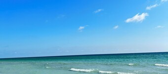 Cozy Modern Beachside Condo Sleeps 4 in Madeira Beach- Steps away from the sand.