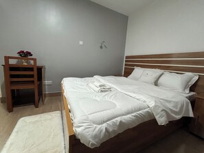2 chambres, fer et planche à repasser, accès au Wi-Fi (inclus)