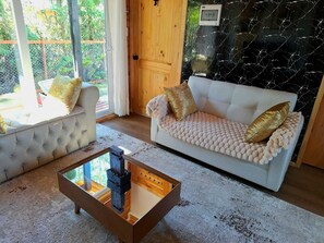 Living area - Cabaña Premium a Pasos de la Playa con Hot Tub e Hidromasaje. (Puerto Varas)