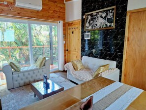 Living area - Cabaña Premium a Pasos de la Playa con Hot Tub e Hidromasaje. (Puerto Varas)
