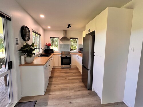 Evergreen Estate Muriwai Valley - peaceful comfortable country setting.