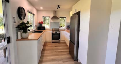 Evergreen Estate Muriwai Valley - peaceful comfortable country setting.