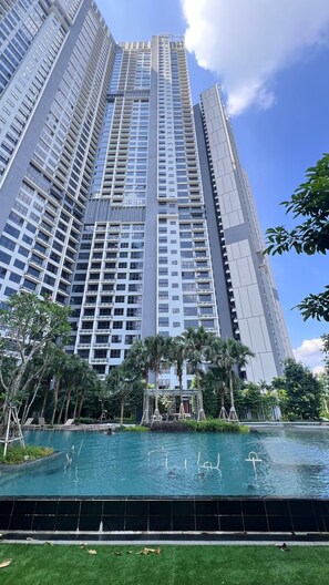 A high-rise building with a swimming pool in the foreground. - City Haven Bukit Bintang (Kuala Lumpur)