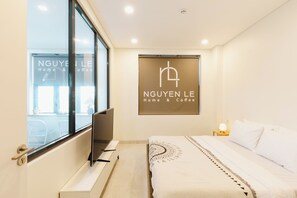 Apartemen Deluks, balkon, pemandangan kota | Meja kerja, setrika/meja setrika, dan Wi-Fi gratis