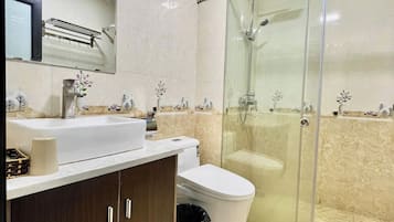 Shower, rainfall showerhead, designer toiletries, hair dryer