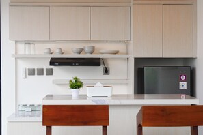 LaLuxe A9 - Villa Cempaka | Private kitchen | Fridge, microwave, stovetop, highchair - LaLuxe Villa and Residence (Denpasar)