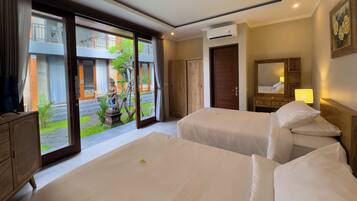 Habitación superior, 2 camas individuales | Escritorio, espacio para trabajar con un portátil, wifi gratis