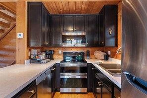 Microwave, oven, stovetop, dishwasher - The Cabin on Kettlewood Acres (Plymouth)