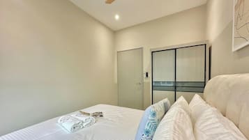 Apartemen, 3 kamar tidur, balkon, pemandangan kota | Tirai kedap cahaya, setrika/meja setrika, dan Wi-Fi gratis