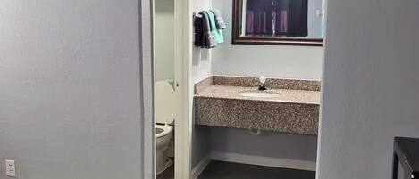Hair dryer, towels, soap, toilet paper