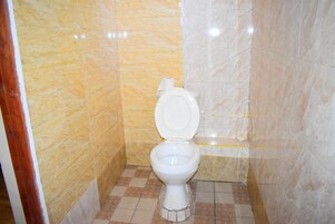Deluxe Double Room | Bathroom | Shower, slippers, towels, soap
