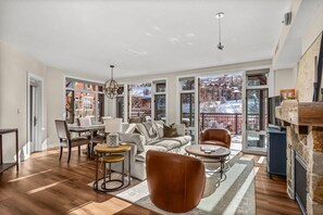 TV, fireplace - Sunny Mountain Retreat Near Gondola. Expansive Deck with Mountain Views & Air Conditioning! (Snowmass Village)