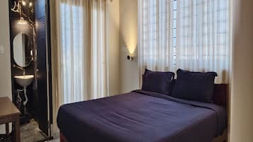 Estúdio executivo | Escrivaninha, Wi-Fi de cortesia, roupa de cama