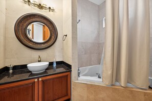 Shower, jetted tub, hair dryer, towels
