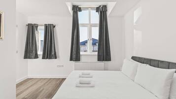 Fer et planche Ă repasser, accĂšs Internet, draps fournis