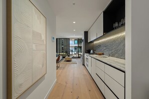Fridge, oven, dishwasher, coffee/tea maker - Westside Place 907 – Indoor–Outdoor Living (Melbourne)