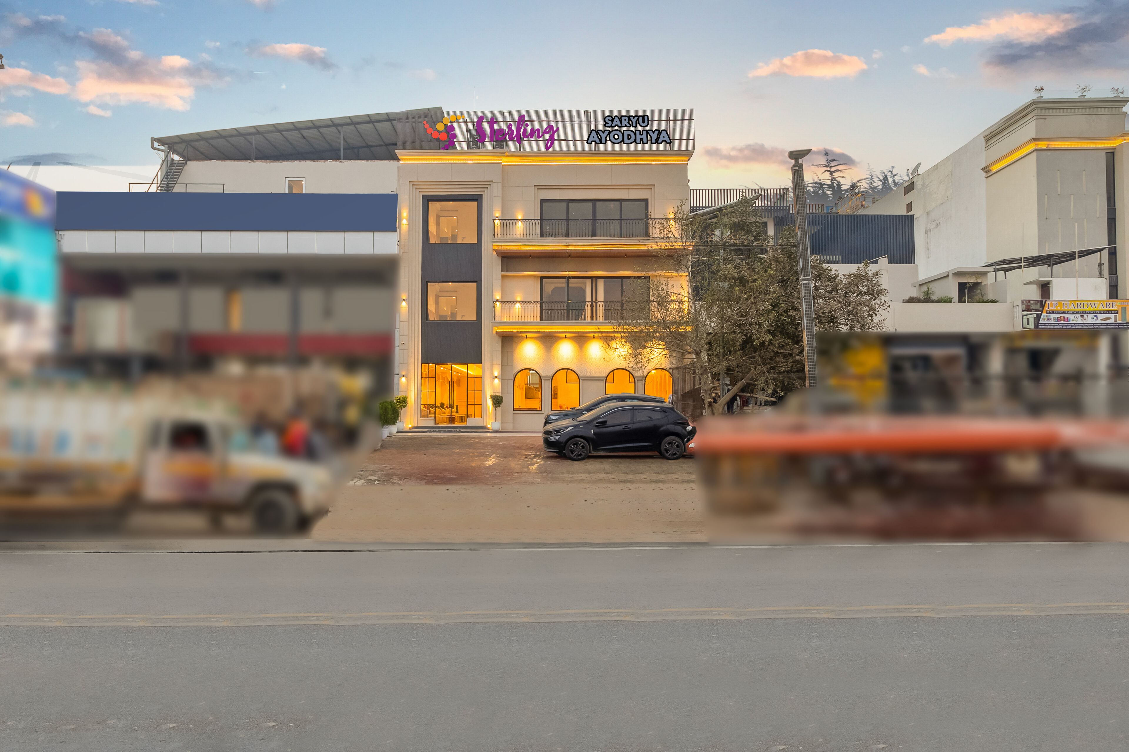 A modern building with a sign reading "Sartou" and "Sartou Aytchyna".