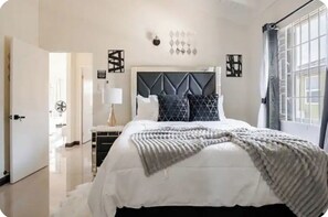 2 chambres, fer et planche à repasser, Wi-Fi, draps fournis