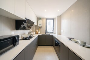 Elite Apartment | Private kitchen | Full-sized fridge, cookware/dishes/utensils, cleaning supplies - Today Aparthotel (Shanghai)