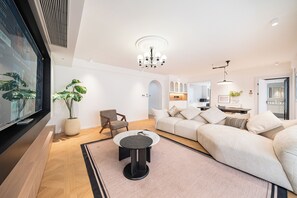 Apartment | Living area | 60-inch Smart TV with digital channels - Today Aparthotel (Shanghai)