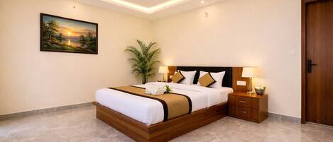 Habitación Deluxe con 1 cama matrimonial o 2 individuales | Insonorización y ropa de cama