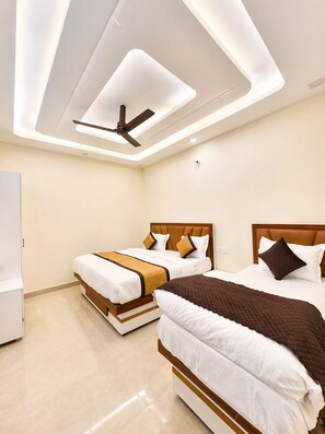 Family Triple Room | Soundproofing, bed sheets - Hotel R.K. Palace near Banke Bihari Temple (Vrindavan)