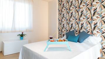 Deluxe Room, 1 Bedroom, Air conditioning, Pool View | Minibar, in-room safe, individually decorated, individually furnished