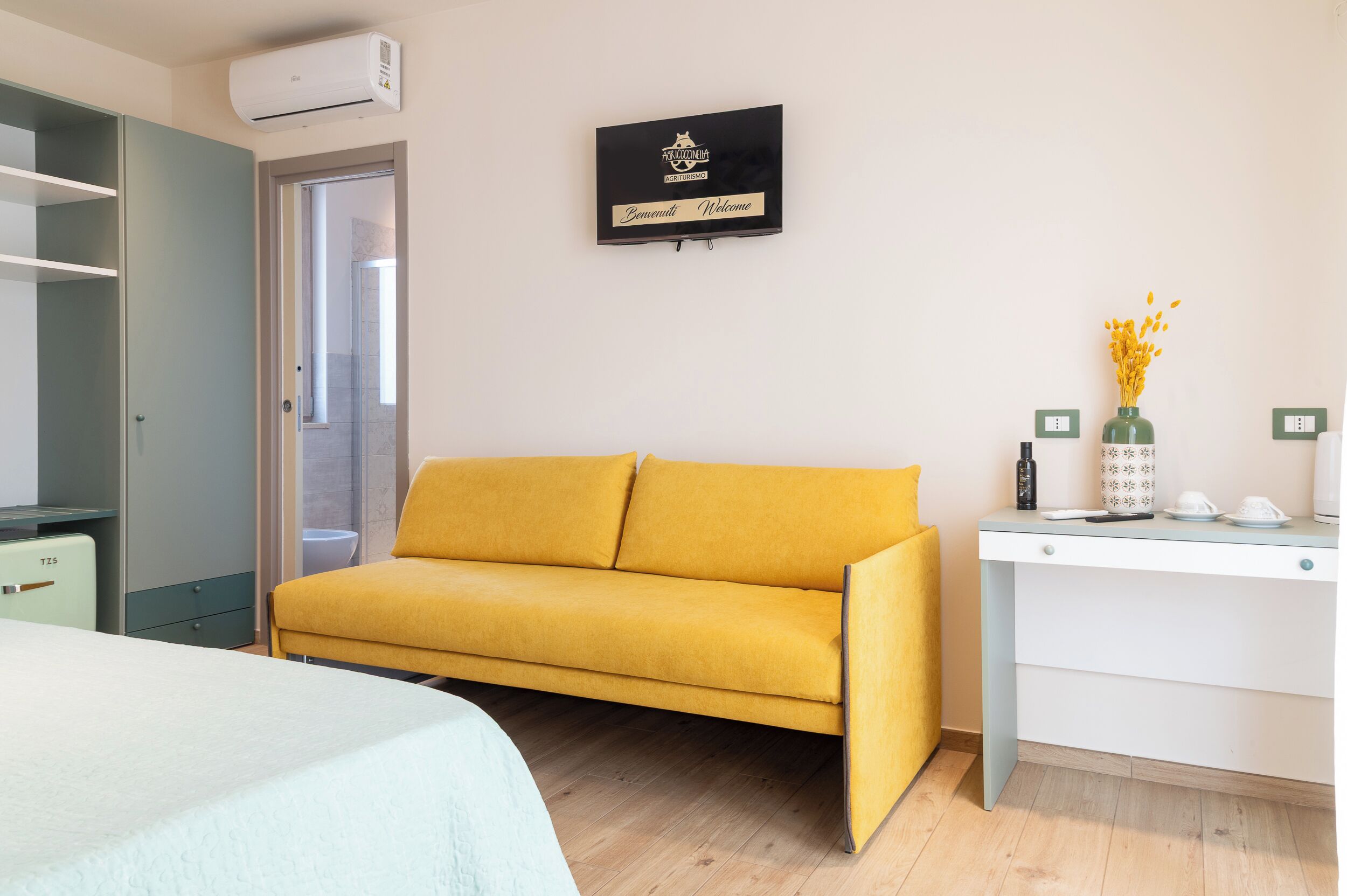 Deluxe Room, 1 Bedroom, Air conditioning, Pool View | Minibar, in-room safe, individually decorated, individually furnished