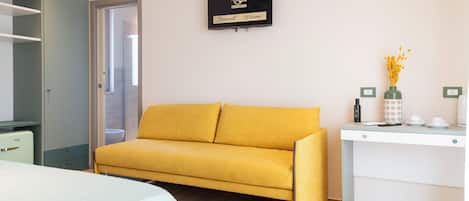 Deluxe Room, 1 Bedroom, Air conditioning, Pool View | Minibar, in-room safe, individually decorated, individually furnished