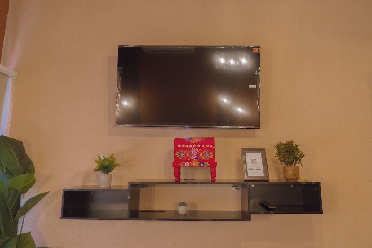 Caja de seguridad en la habitación y cortinas blackout